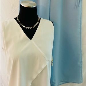 White sleeveless top